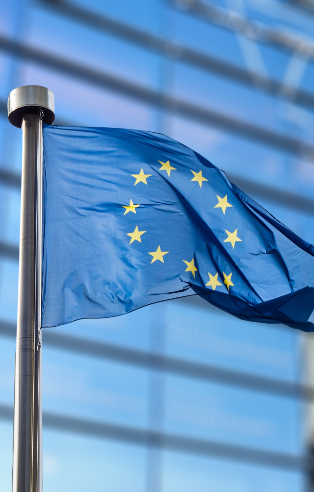 EU flag full mast on the Berlaymont background